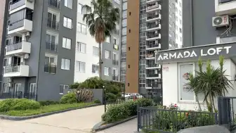 Adana'da Yüksek Ses Tartışması Silahlı Saldırıya Dönüştü: Komşunun Evine Ateş Açıldı